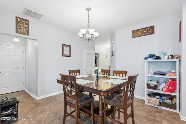 dining area with visible vents, baseboards, and a notable chandelier