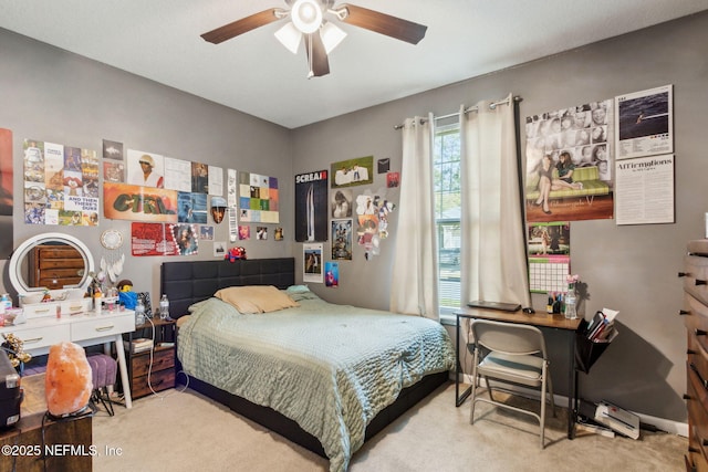 bedroom featuring carpet flooring, baseboards, and ceiling fan