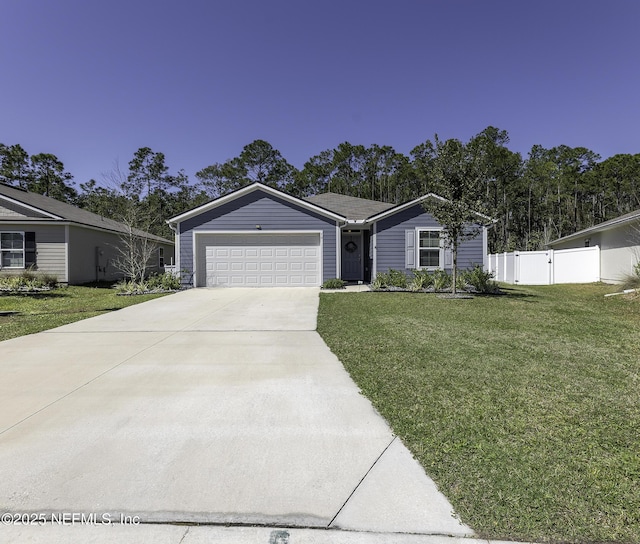 ranch-style home featuring a front lawn, a gate, fence, concrete driveway, and an attached garage