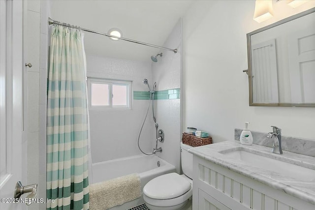 bathroom with vanity, toilet, and shower / bath combo with shower curtain