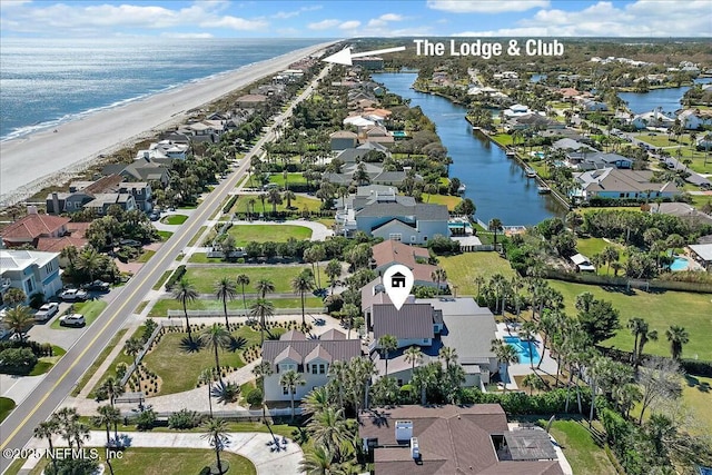 aerial view with a residential view and a water view