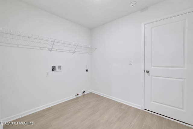 251 Pinzon Pl, Saint Augustine, FL 32095 - laundry room featuring gas dryer hookup, hookup for a washing machine, light wood-style floors, and electric dryer hookup