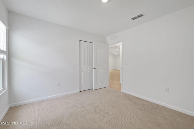 251 Pinzon Pl, Saint Augustine, FL 32095 - unfurnished bedroom with carpet and a closet
