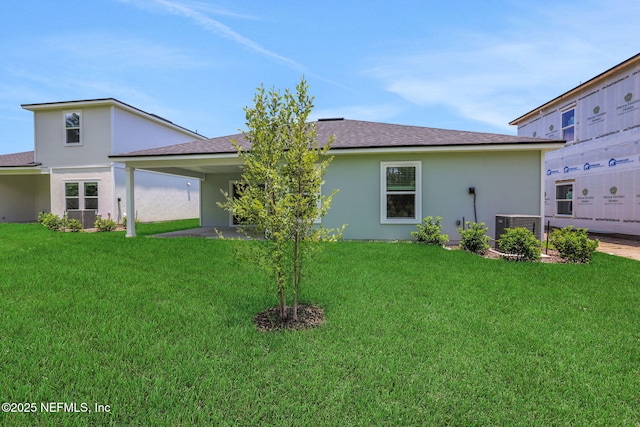 251 Pinzon Pl, Saint Augustine, FL 32095 - back of house featuring a yard and stucco siding