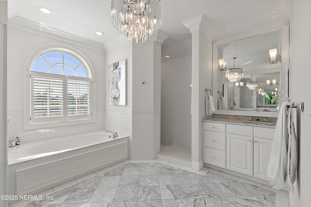 bathroom with crown molding, walk in shower, a bath, a notable chandelier, and vanity