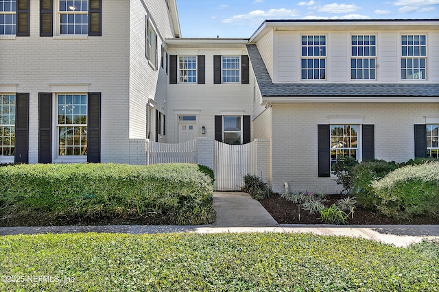 view of front of property with brick siding