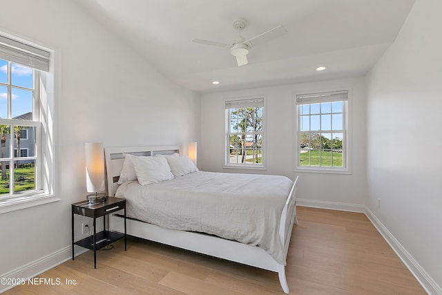 bedroom featuring recessed lighting, light wood-style floors, baseboards, and ceiling fan