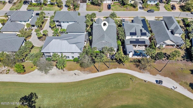 birds eye view of property with a residential view