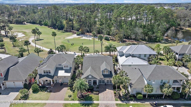 bird's eye view with a residential view and a wooded view