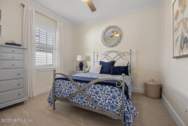 bedroom featuring ceiling fan, baseboards, carpet, and ornamental molding