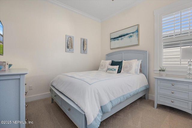 carpeted bedroom with baseboards and crown molding