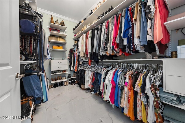 spacious closet with marble finish floor