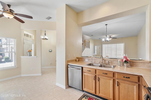 kitchen with visible vents, ceiling fan with notable chandelier, a sink, stainless steel dishwasher, and light tile patterned flooring