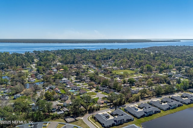 bird's eye view with a residential view and a water view