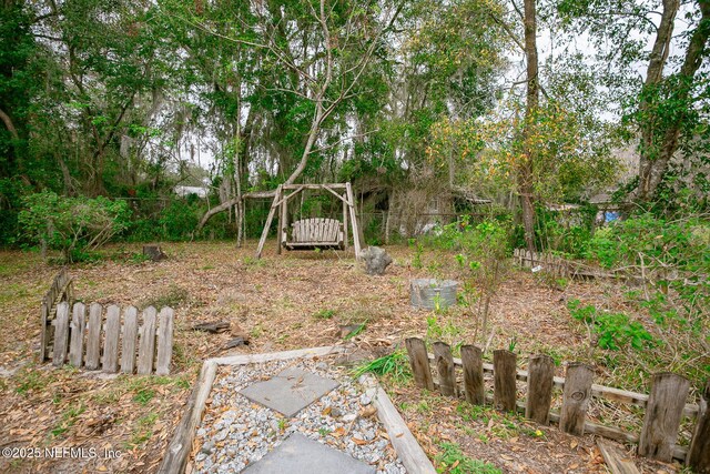 view of yard with fence