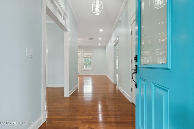 foyer with visible vents, baseboards, ornamental molding, recessed lighting, and dark wood-style floors