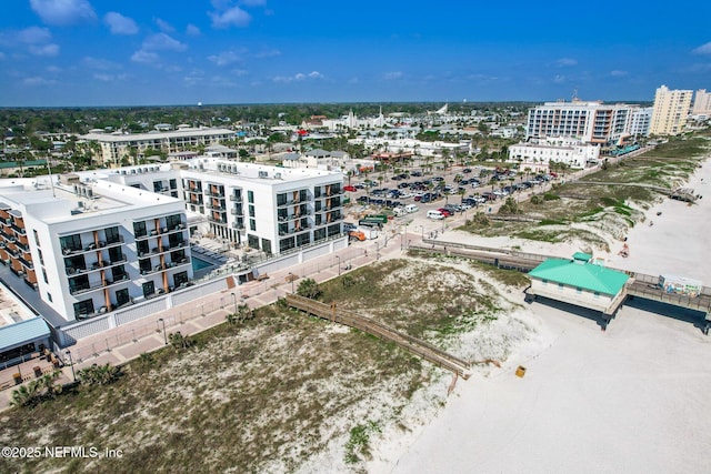 birds eye view of property with a city view