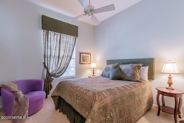 bedroom with light colored carpet and ceiling fan