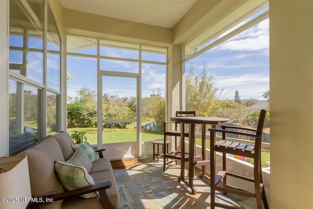 sunroom featuring a healthy amount of sunlight