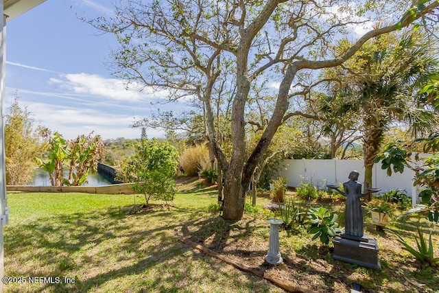 view of yard with fence