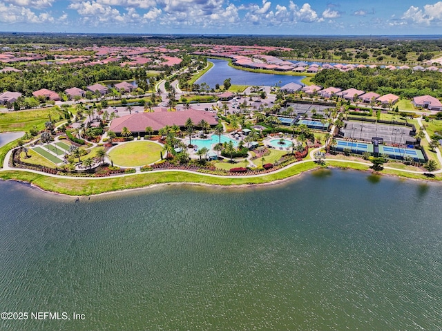 birds eye view of property featuring a water view and a residential view