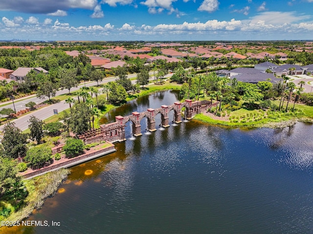 aerial view with a residential view and a water view