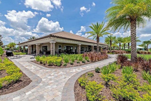 surrounding community featuring a patio