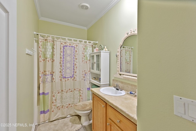 bathroom featuring vanity, crown molding, toilet, and tasteful backsplash