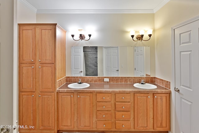 full bathroom with a sink, double vanity, and crown molding