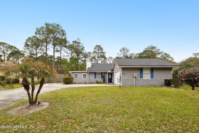 ranch-style home with a front lawn, driveway, stone siding, a garage, and a chimney