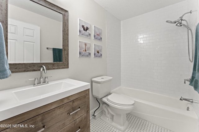 full bathroom with vanity, bathtub / shower combination, a textured ceiling, tile patterned floors, and toilet