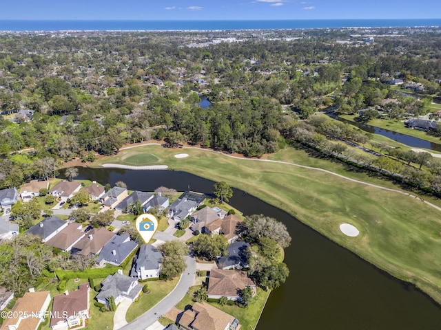 bird's eye view featuring a residential view, golf course view, and a water view