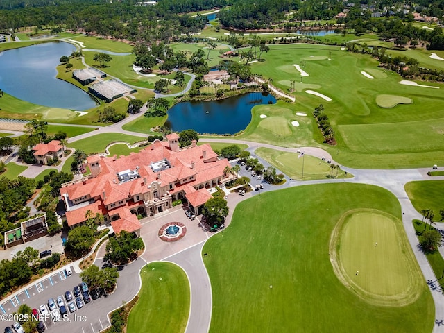 bird's eye view featuring a water view and golf course view