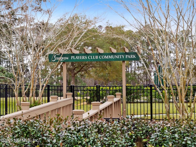 surrounding community featuring fence