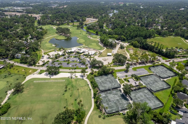 drone / aerial view featuring a water view and view of golf course