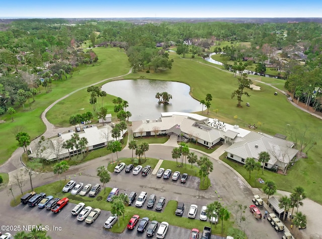 aerial view featuring a water view and golf course view