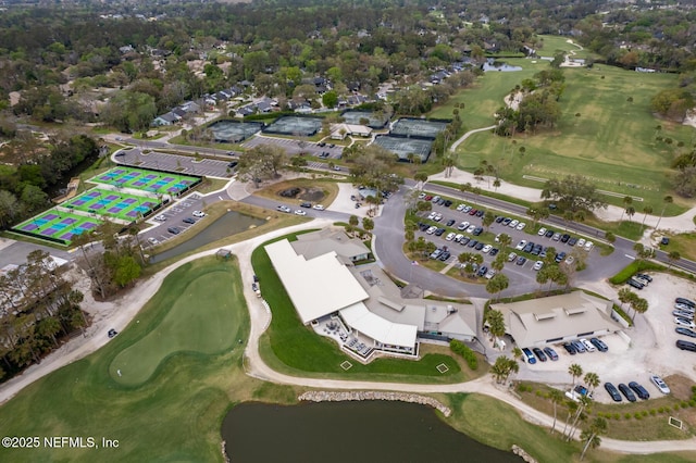 birds eye view of property featuring a water view and golf course view