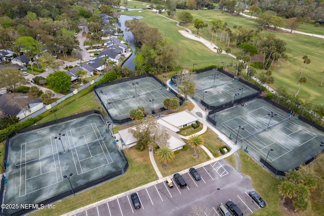 birds eye view of property featuring view of golf course