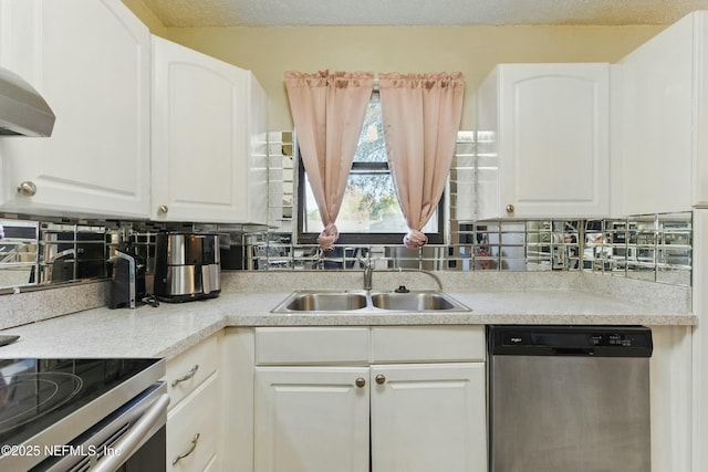 kitchen featuring a sink, backsplash, dishwasher, and white cabinetry