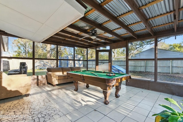 sunroom / solarium featuring billiards and a ceiling fan