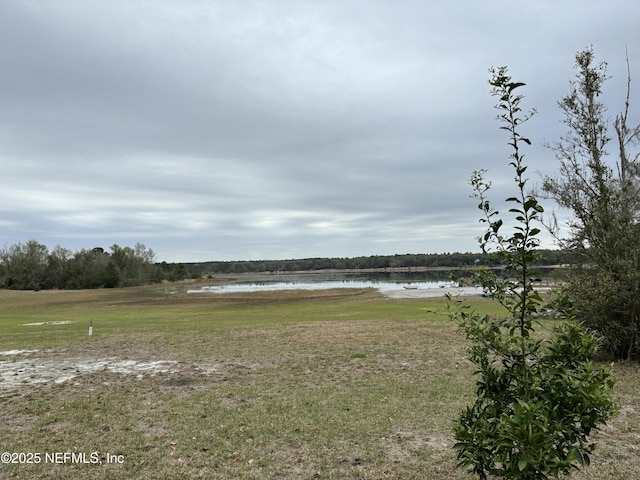 view of yard with a water view