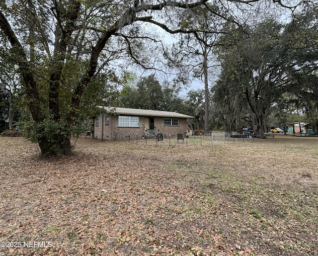 view of yard with fence