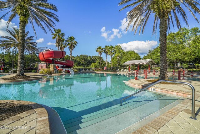 pool with a water slide