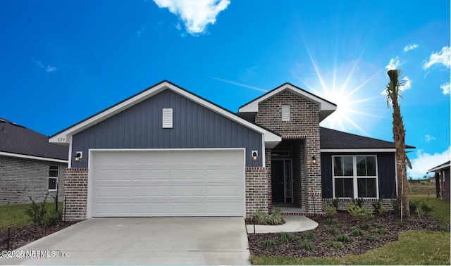 ranch-style home with concrete driveway, a garage, and brick siding