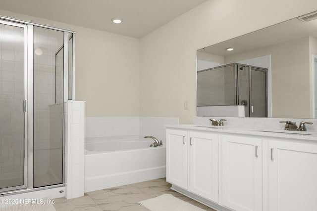 full bathroom featuring a bath, visible vents, a shower stall, and a sink