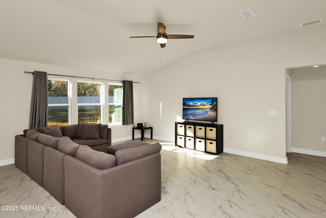 living room featuring lofted ceiling, baseboards, visible vents, and marble finish floor