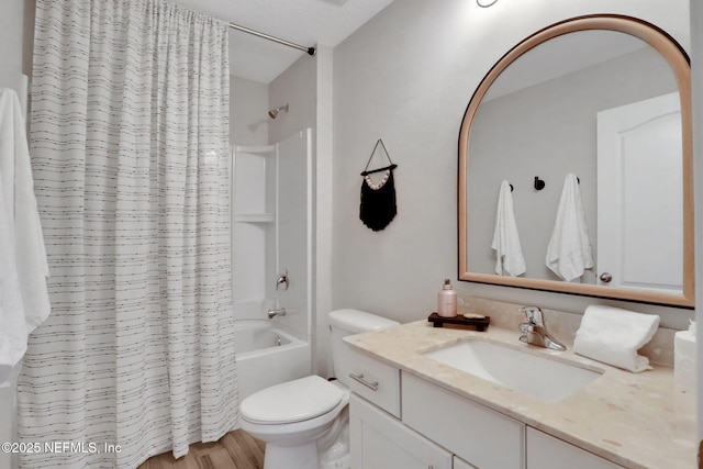 bathroom with toilet, vanity, and shower / bathtub combination with curtain