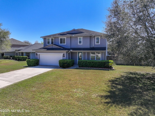 traditional home with stucco siding, driveway, a front yard, and fence