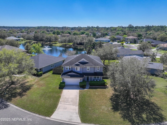 aerial view featuring a residential view and a water view