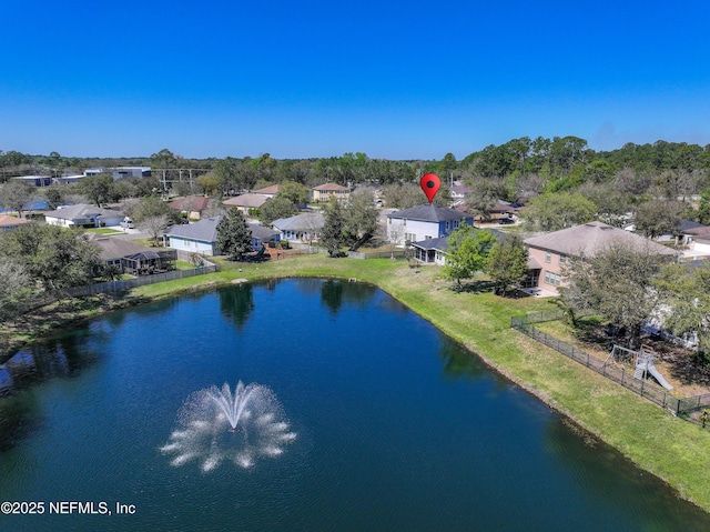 aerial view featuring a water view and a residential view